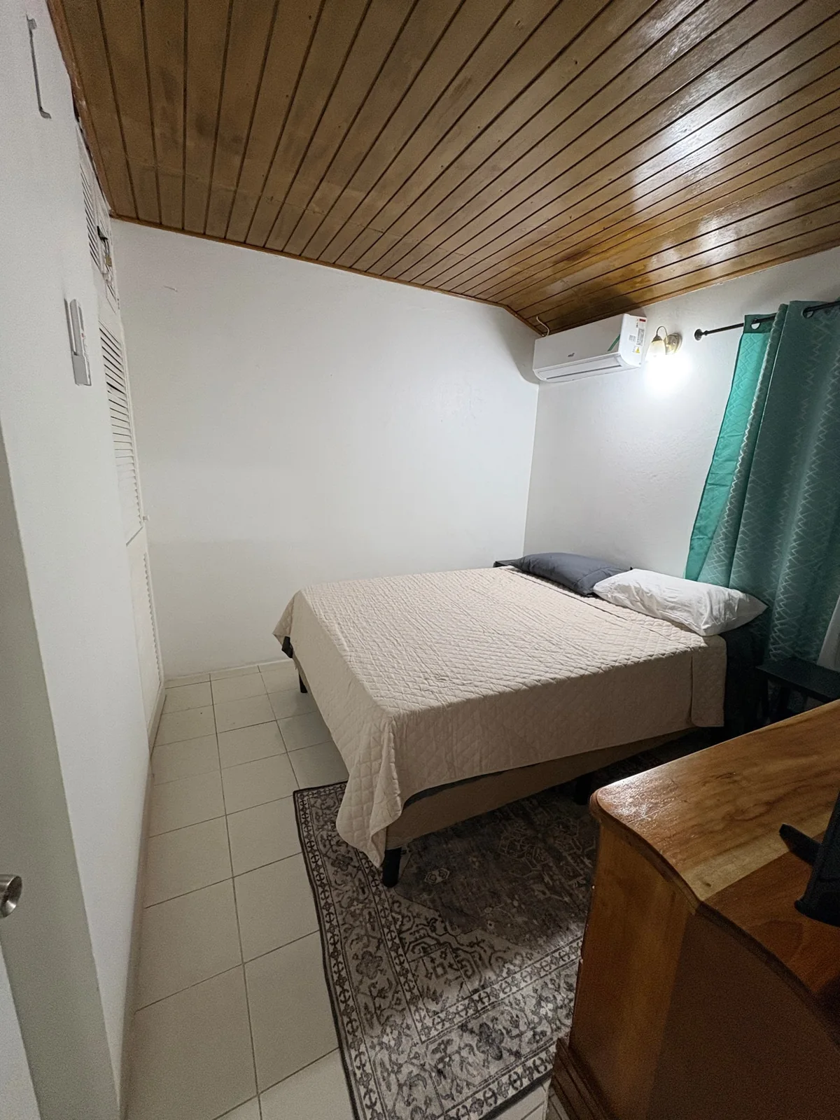 Second bedroom with a queen bed in Canopy View Villa