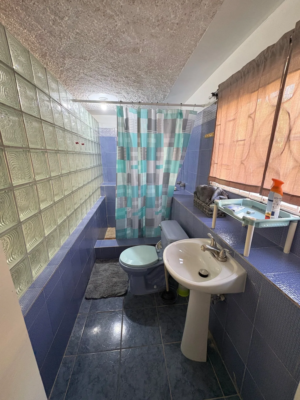 Bathroom with a pedestal basin in Sea View Villa